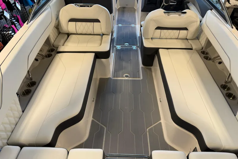 Slide: The Image of Luxurious interior of 2026 Regal LS6 Surf boat with elegant seating and modern design. - 14