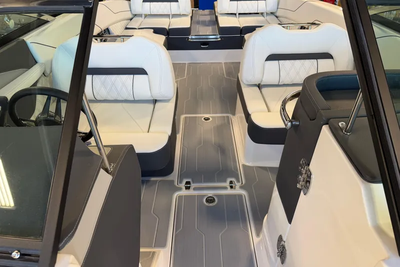 Slide: The Image of Luxurious interior of 2026 Regal LS6 Surf boat with elegant seating and modern design. - 19
