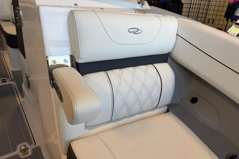 Slide: The Image of Luxurious seating in the 2026 Regal LS6 Surf boat, featuring elegant stitching and design. - 23
