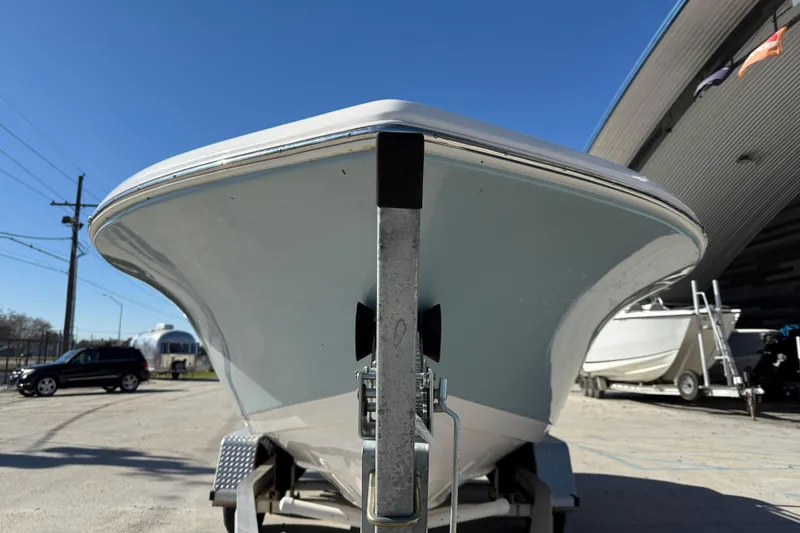 Slide: The Image of 2023 Tidewater 198 CC Adventure boat on trailer, viewed from the front. - 3