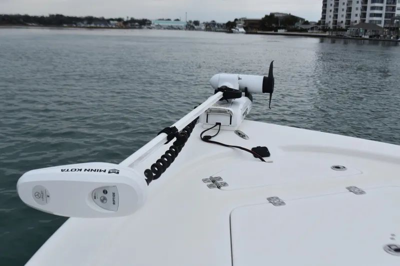Slide: The Image of 2020 Sea Pro 208 Bay boat with Minn Kota trolling motor on calm water. - 15