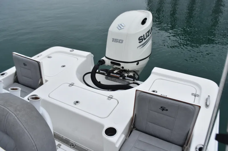 Slide: The Image of 2020 Sea Pro 208 Bay boat with Suzuki 150 outboard motor on calm water. - 22