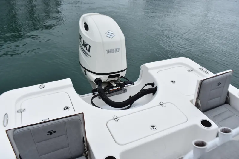 Slide: The Image of 2020 Sea Pro 208 Bay boat with Suzuki 150 outboard motor on calm water. - 23