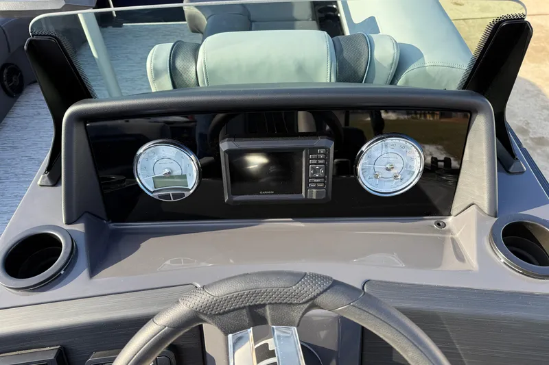 Slide: The Image of Dashboard of 2026 Bennington 22 S Sport Quad Bench with gauges and controls. - 18