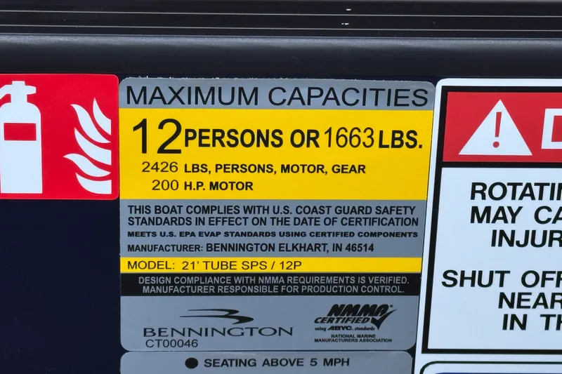 Slide: The Image of 2026 Bennington 22 S Sport Quad Bench capacity label, 12 persons or 1663 lbs, 200 HP motor. - 21