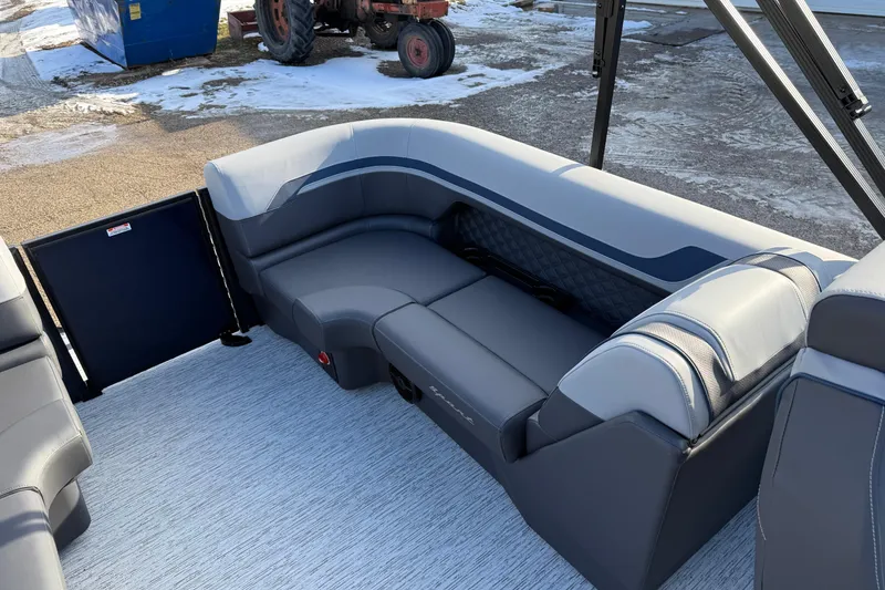 Slide: The Image of 2026 Bennington 22 S Sport Quad Bench interior with sleek, modern seating design. - 22