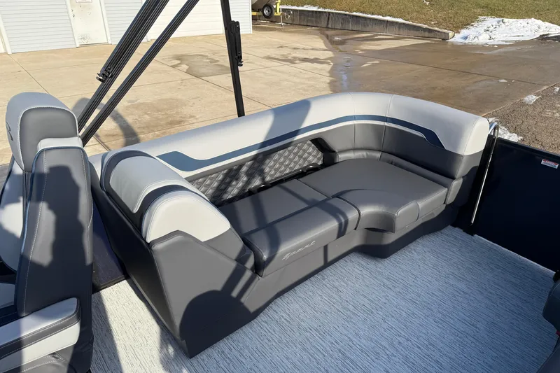 Slide: The Image of 2026 Bennington 22 S Sport Quad Bench with gray and white seating on a boat deck. - 23