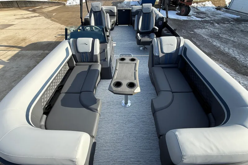 Slide: The Image of 2026 Bennington 22 S Sport Quad Bench pontoon boat interior with luxurious seating. - 8