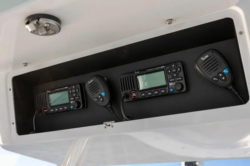Slide: The Image of 2024 Onslow Bay 33 TE boat communication system with Icom radios and microphones. - 25