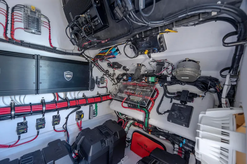 Slide: The Image of 2024 Onslow Bay 33 TE boat electrical system with organized wiring and components. - 45