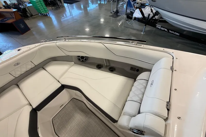 Slide: The Image of Luxurious interior of 2026 Regal LS4 boat with white leather seating and modern design. - 16