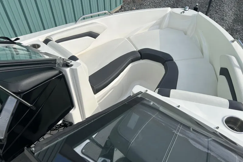 Slide: The Image of 2016 Larson LX 205S IO boat interior with sleek seating and modern design. - 24