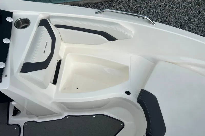 Slide: The Image of 2016 Larson LX 205S IO boat interior with white and black seating. - 27
