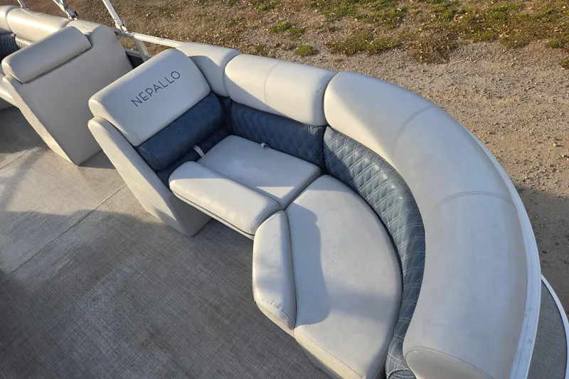 Slide: The Image of Luxurious Nepallo 20TL 2022 boat seating with elegant blue and white upholstery. - 12