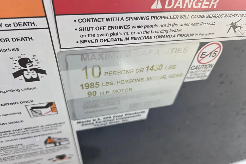 Slide: The Image of Safety and capacity warning label on 2022 Nepallo 20TL boat. - 15