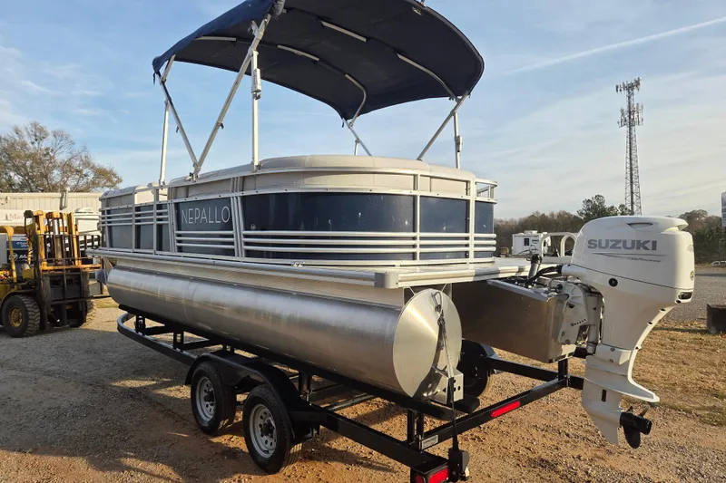 Slide: The Image of 2022 Nepallo 20TL pontoon boat with Suzuki outboard motor on trailer. - 3