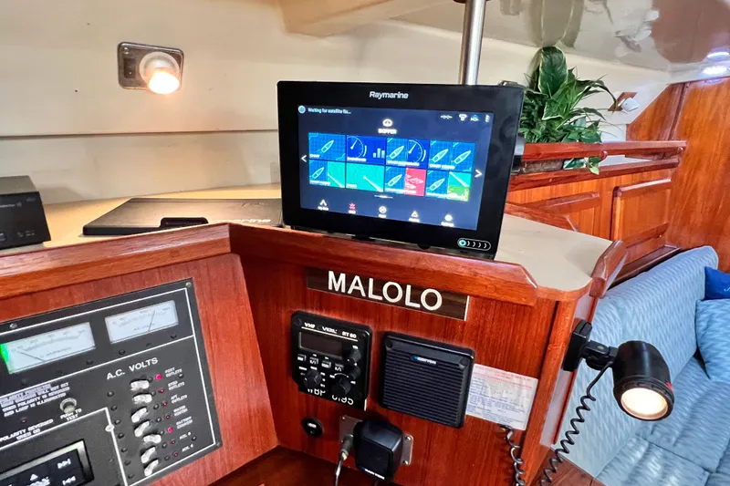 Slide: The Image of Control panel of 1990 Hunter Legend 40 sailboat with navigation equipment. - 32