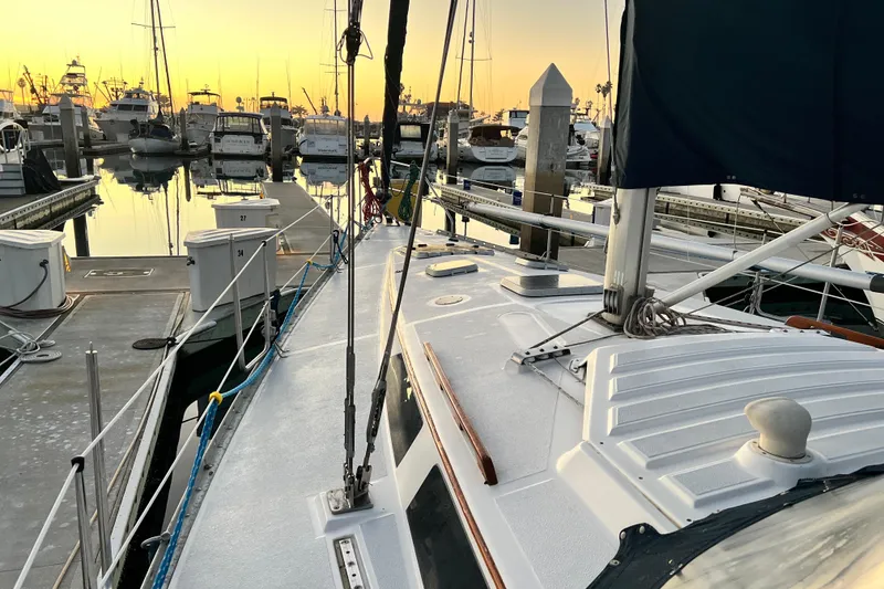 Slide: The Image of Hunter Legend 40 sailboat docked at marina during sunset, 1990 model. - 8