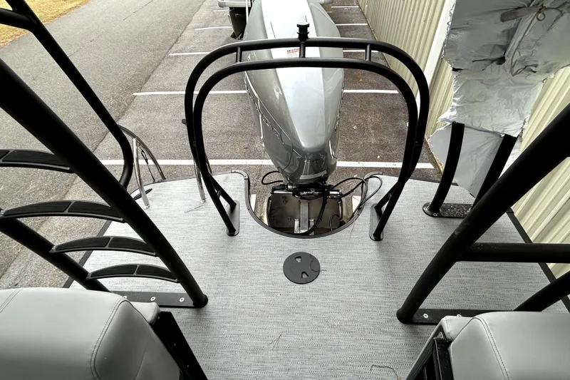 Slide: The Image of 2026 Godfrey Monaco 255 SDC boat with sleek design and modern features. - 11