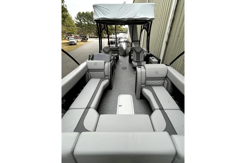 Slide: The Image of 2026 Godfrey Monaco 255 SDC pontoon boat with spacious seating and modern design. - 14