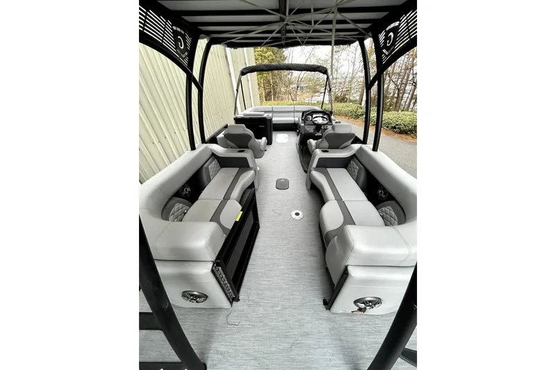 Slide: The Image of 2026 Godfrey Monaco 255 SDC boat interior with spacious seating and modern design. - 7