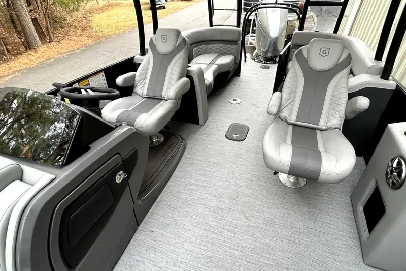 Slide: The Image of Luxurious interior of 2026 Godfrey Monaco 255 SDC boat with plush seating and modern design. - 9