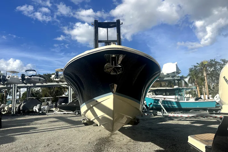 Slide: The Image of 2026 Chris-Craft Sportster 28 boat on display under a clear blue sky. - 4