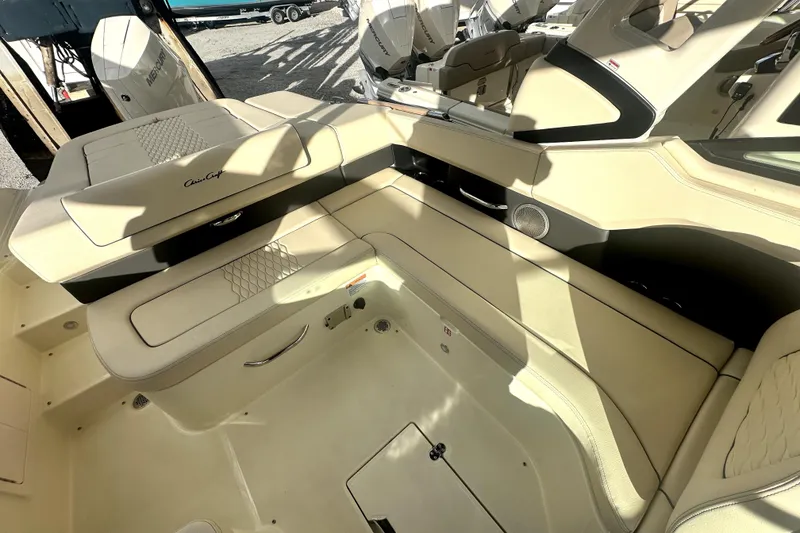 Slide: The Image of 2026 Chris-Craft Sportster 28 interior with beige seating and modern design. - 8