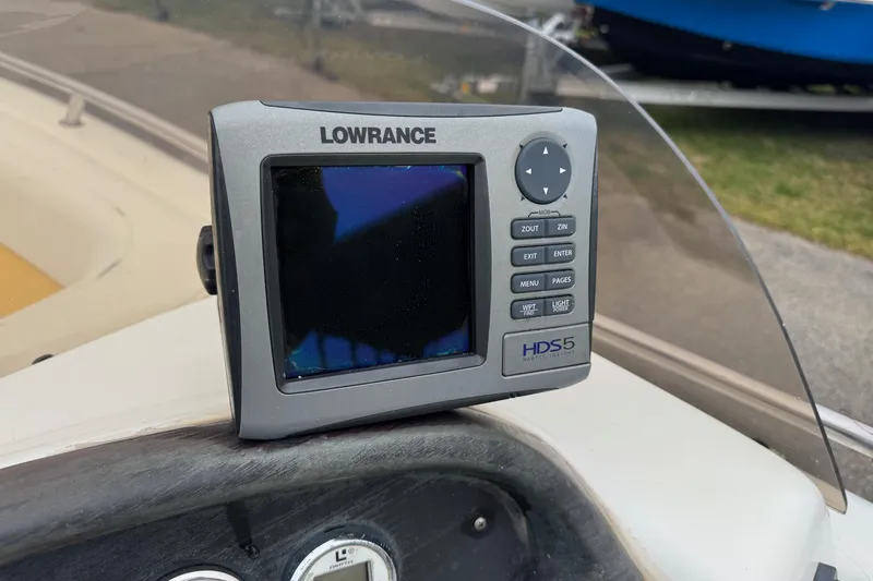 Slide: The Image of Lowrance HDS5 marine GPS on 2003 VIP Deckliner 224 boat dashboard. - 16