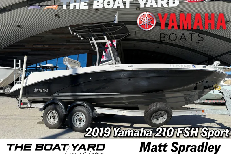 The Image of 2019 Yamaha 210 FSH Sport boat on trailer at The Boat Yard dealership. - 1