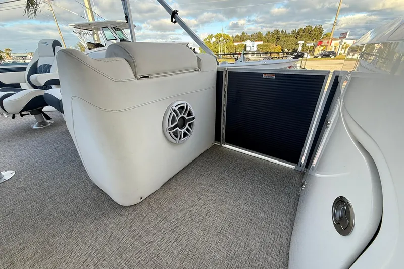 Slide: The Image of 2019 Bennington R 25 RL boat interior with seating and speaker detail. - 19