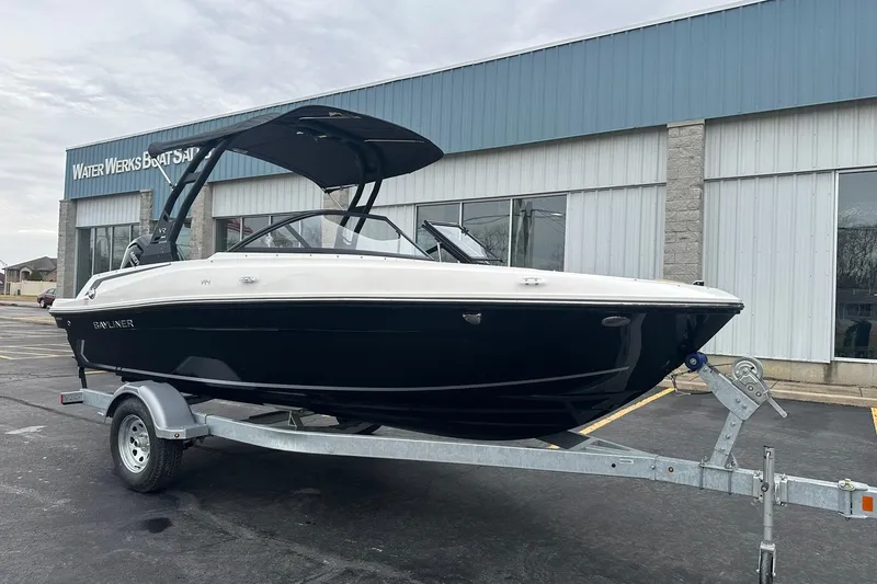 Slide: The Image of 2026 Bayliner VR4 Bowrider OB on trailer outside Water Werks Boat Sales. - 2