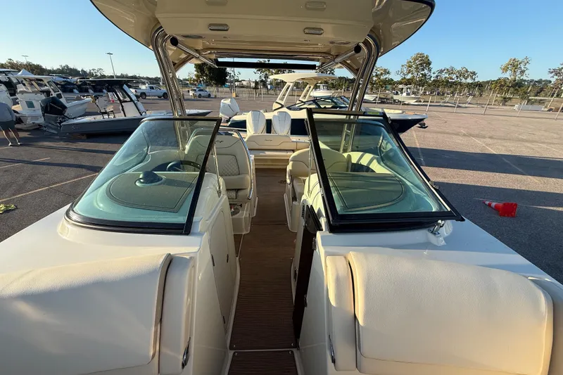 Slide: The Image of 2026 Chris-Craft Calypso 28 boat interior with open cockpit and seating area. - 17