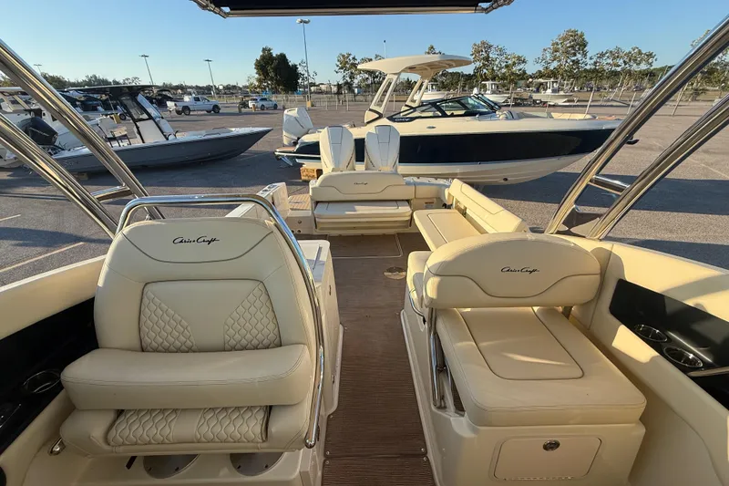 Slide: The Image of 2026 Chris-Craft Calypso 28 boat interior with luxurious seating and elegant design. - 18