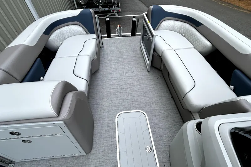 Slide: The Image of Interior of 2026 Godfrey Sweetwater 2286 SFLC pontoon boat with plush seating. - 11