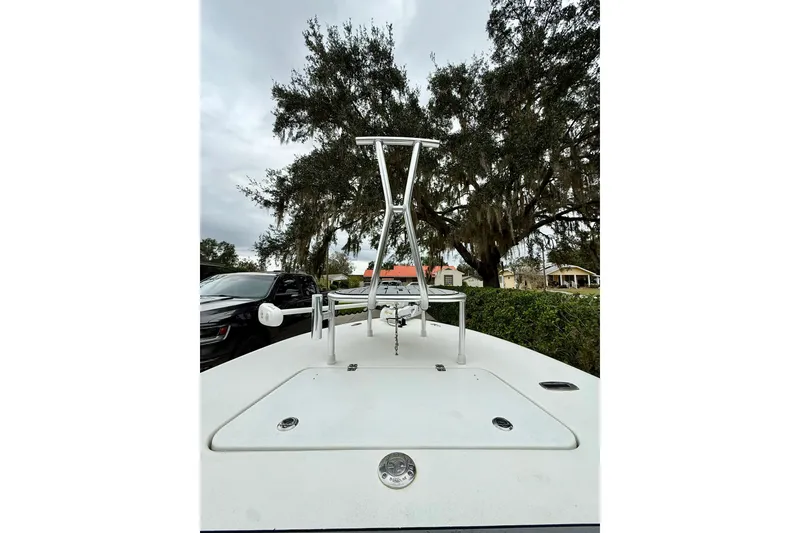 Slide: The Image of 2020 Beavertail Skiffs Vengeance boat deck with trees in the background. - 10