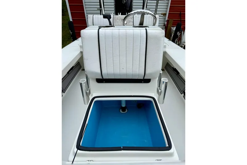 Slide: The Image of 2020 Beavertail Skiffs Vengeance boat interior with open storage compartment. - 11