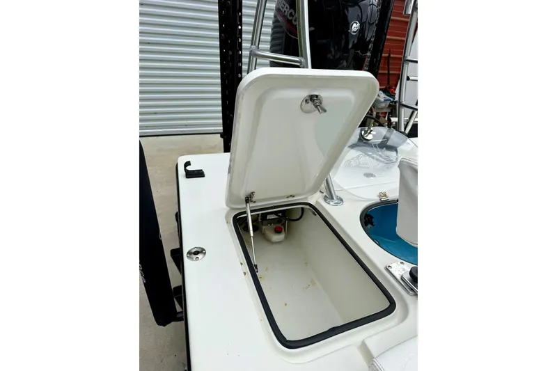Slide: The Image of 2020 Beavertail Skiffs Vengeance boat with open storage compartment. - 16