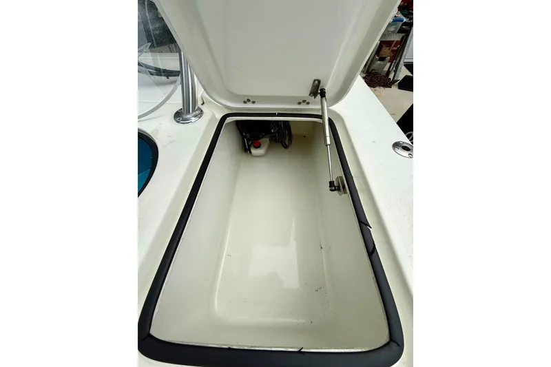 Slide: The Image of Open storage compartment on 2020 Beavertail Skiffs Vengeance boat. - 18