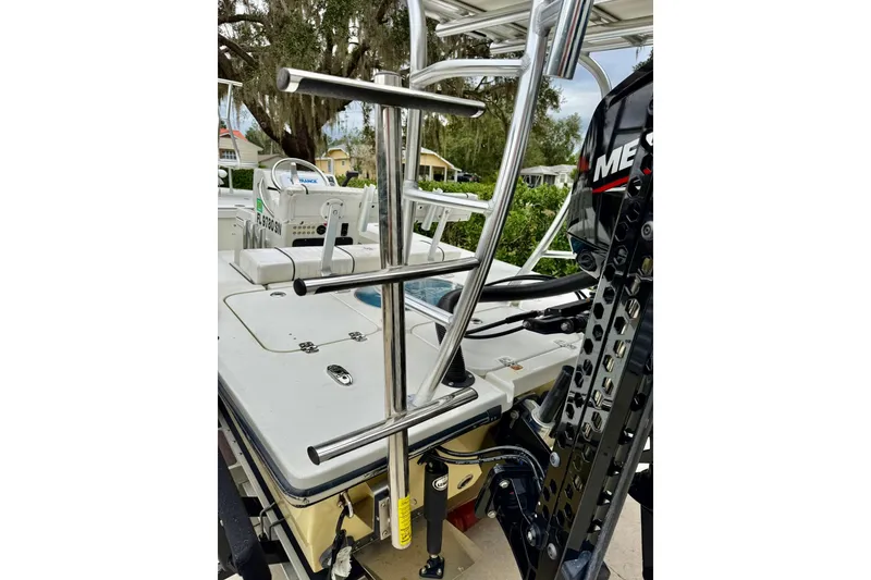 Slide: The Image of 2020 Beavertail Skiffs Vengeance boat with stainless steel ladder and Mercury engine. - 5
