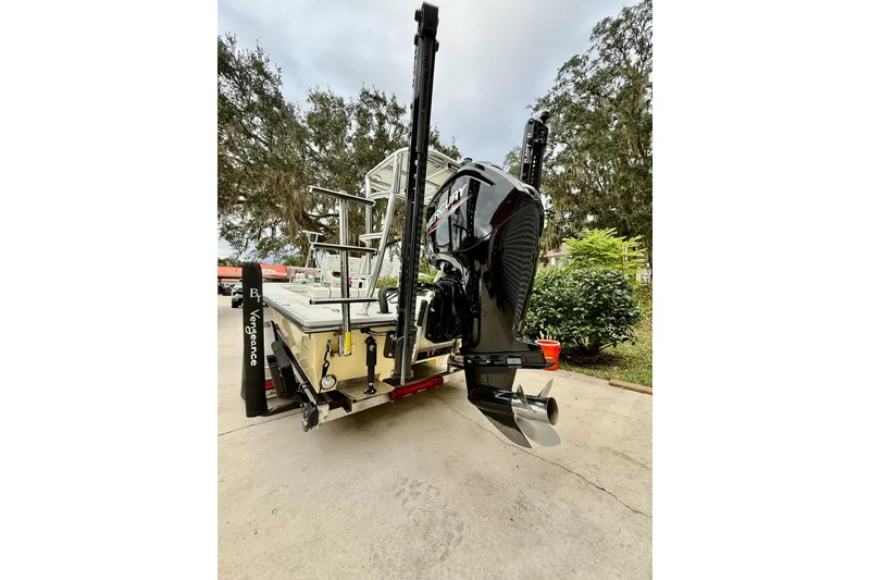 Slide: The Image of 2020 Beavertail Skiffs Vengeance boat with powerful outboard motor, parked outdoors. - 6