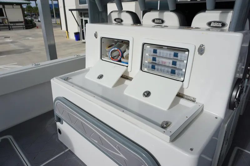 Slide: The Image of 2023 Insetta 35IFC boat interior with storage compartments and seating. - 10