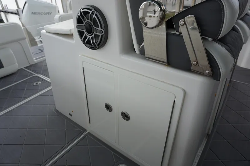 Slide: The Image of 2023 Insetta 35IFC boat interior with speaker and seating detail. - 14