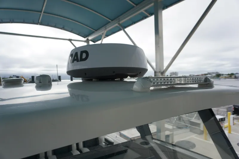 Slide: The Image of 2023 Insetta 35IFC boat radar and light bar under canopy. - 17