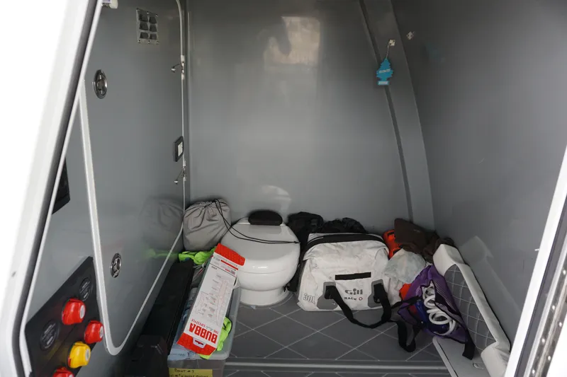 Slide: The Image of 2023 Insetta 35IFC interior storage area with various bags and equipment. - 19