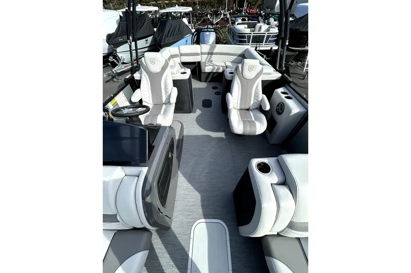 Slide: The Image of 2026 Godfrey Monaco 235 ULC boat interior with luxurious seating and modern design. - 13