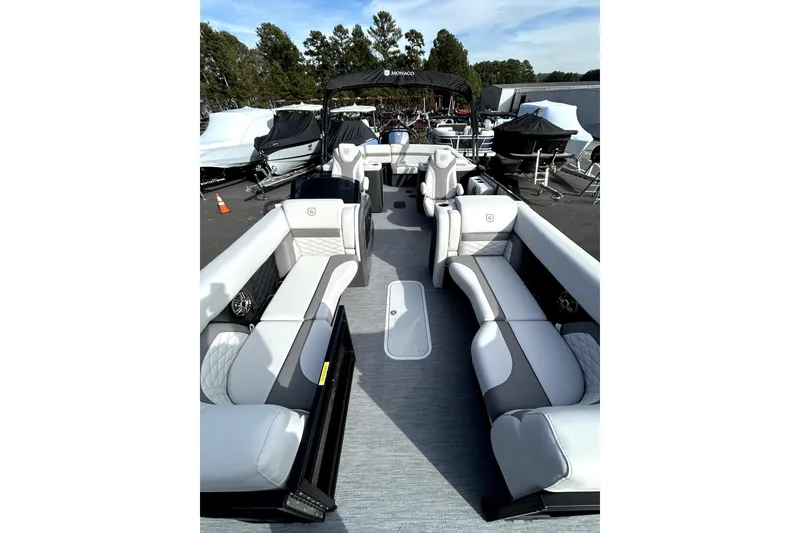 Slide: The Image of 2026 Godfrey Monaco 235 ULC pontoon boat with luxurious seating and modern design. - 7