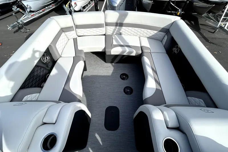 Slide: The Image of 2026 Godfrey Monaco 235 ULC boat interior with luxurious seating and modern design. - 9