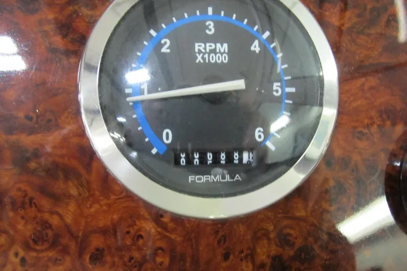 Slide: The Image of Tachometer of 2004 Formula 260 Sun Sport boat, displaying RPM in thousands. - 9
