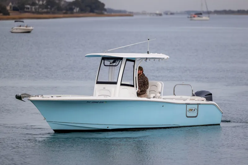 The Image of 2018 Sea Hunt Ultra 255 SE boat cruising on calm waters. - 1
